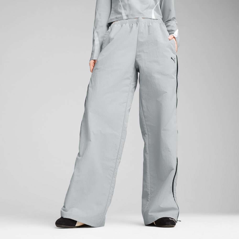 Зображення Puma Штани DARE TO Relaxed Woven Zip-Off Pants Women #1: Flat Light Gray